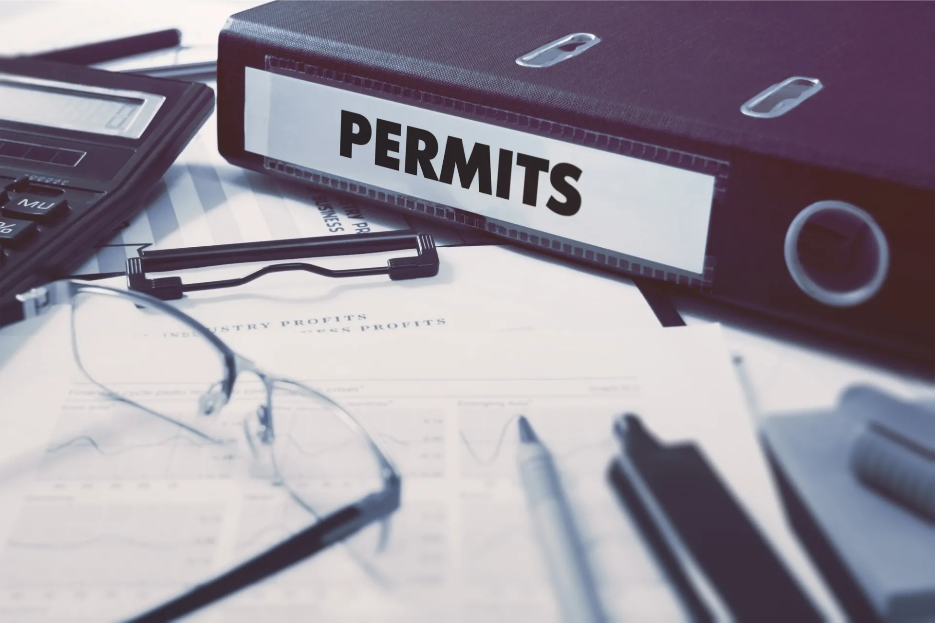 A binder that is labelled permits.