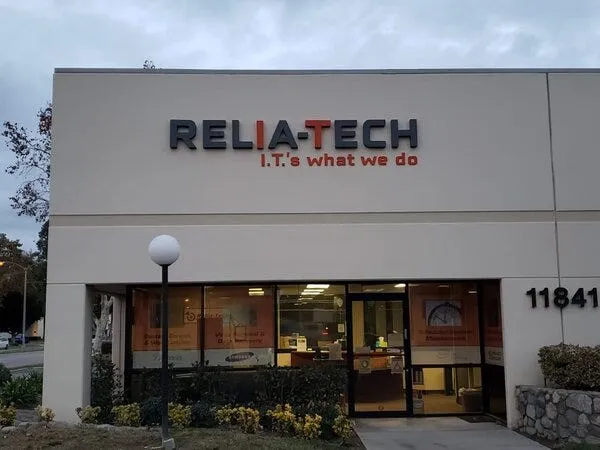 A typical single level commercial office building with channel letter signage on the exterior wall.